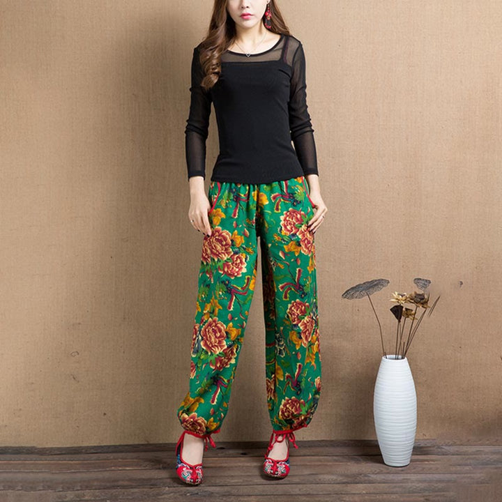 Pantalon sarouel à imprimé fleurs rouges et vertes de style ethnique avec Buddha Stones et poches