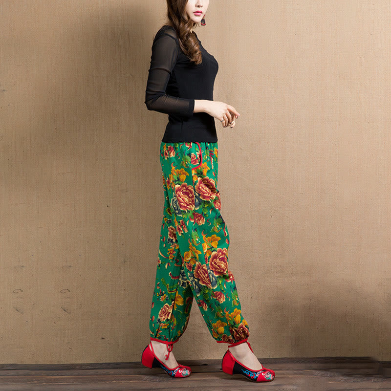 Pantalon sarouel à imprimé fleurs rouges et vertes de style ethnique avec Buddha Stones et poches