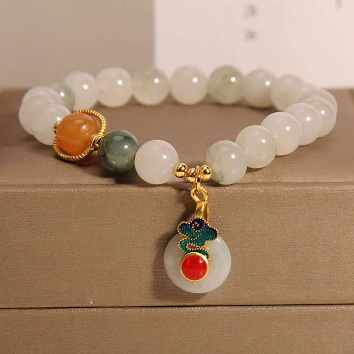 Bracelet de prospérité en jade et agate rouge avec nuages de bon augure et Buddha Stones