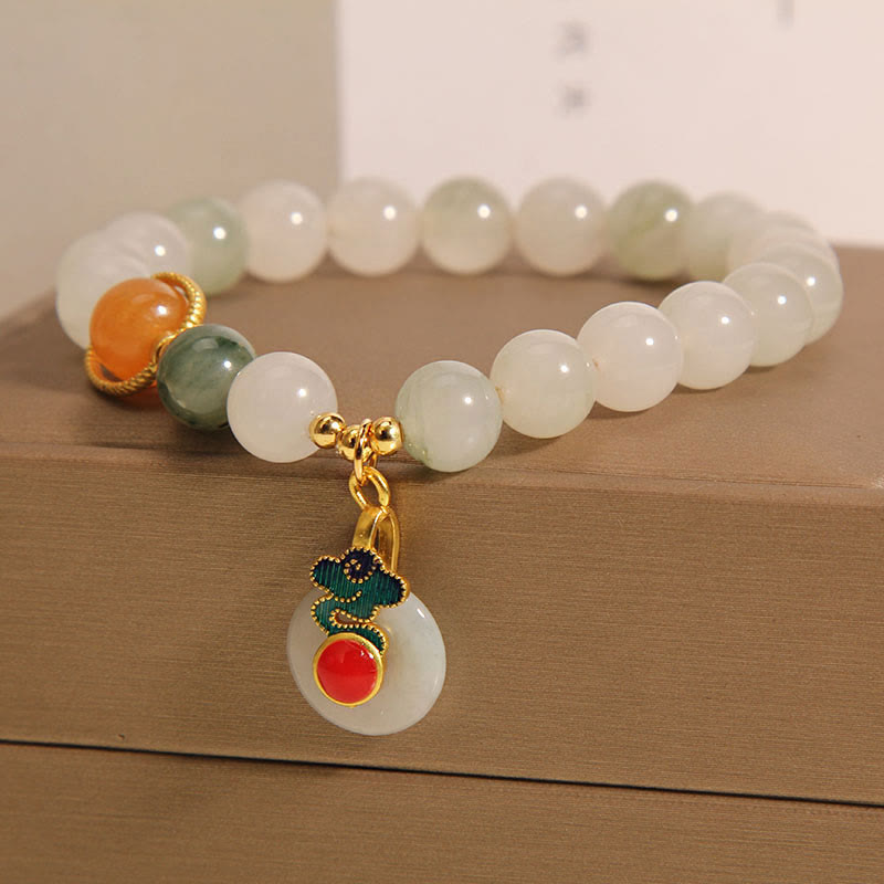 Bracelet de prospérité en jade et agate rouge avec nuages de bon augure et Buddha Stones