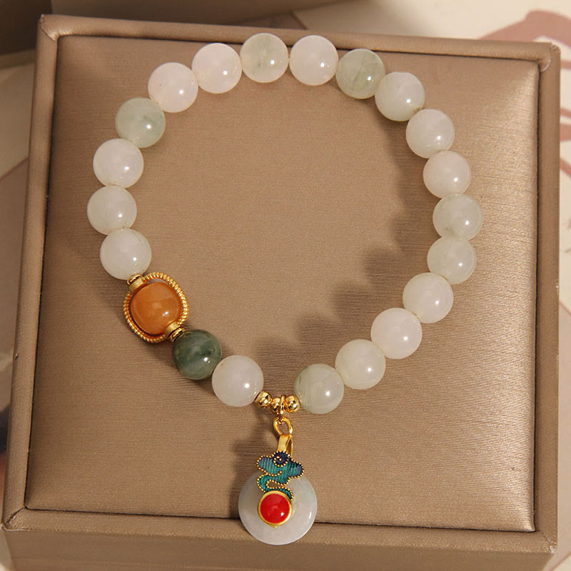 Bracelet de prospérité en jade et agate rouge avec nuages de bon augure et Buddha Stones