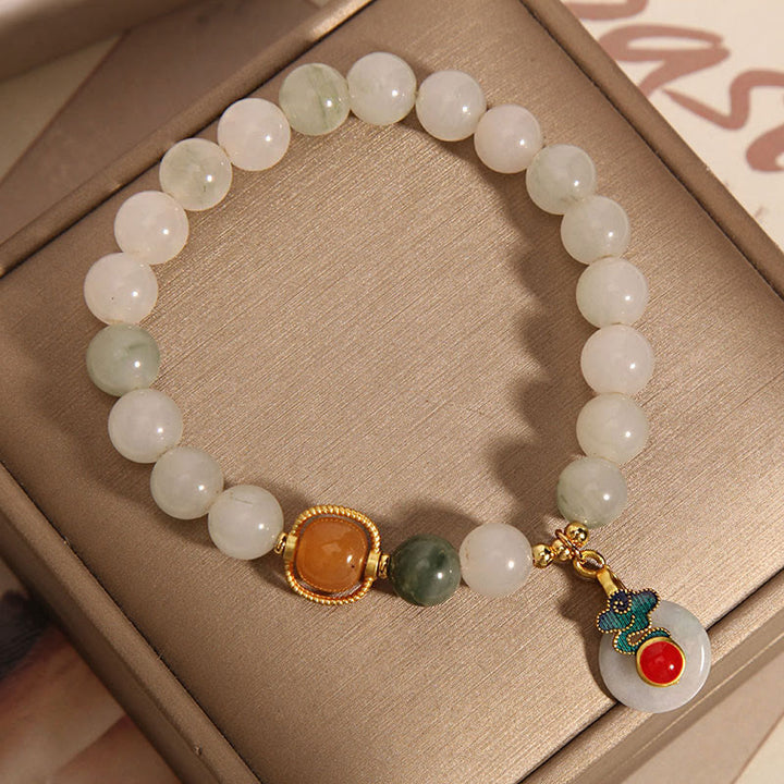Bracelet de prospérité en jade et agate rouge avec nuages de bon augure et Buddha Stones
