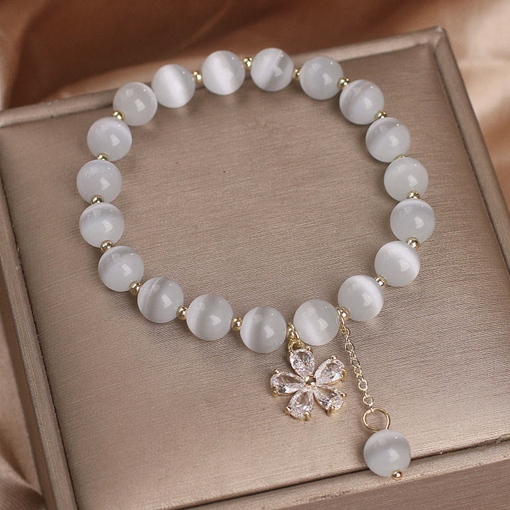 Bracelet de soutien à la paix avec breloque fleur œil de chat et Buddha Stones