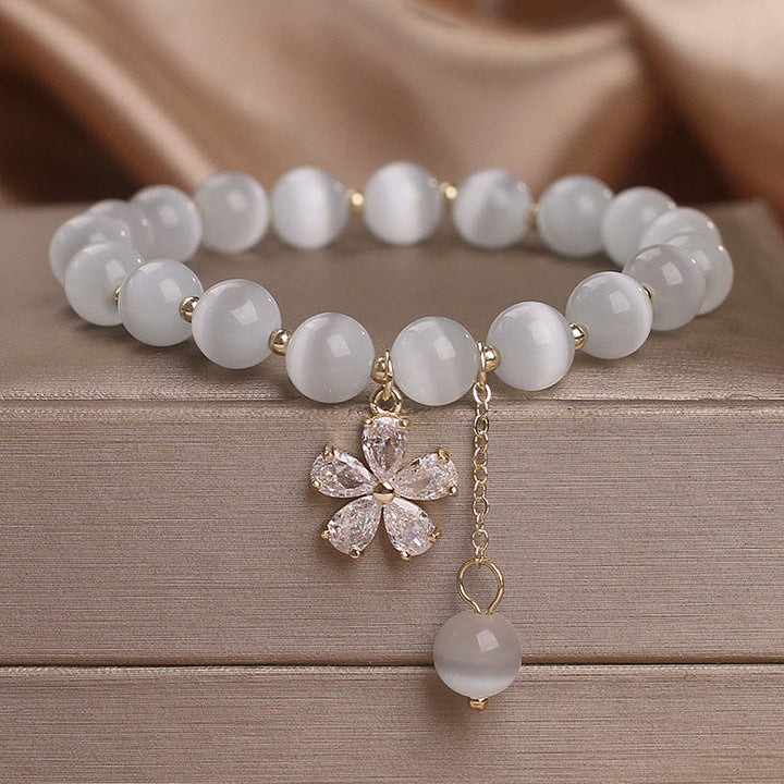 Bracelet de soutien à la paix avec breloque fleur œil de chat et Buddha Stones
