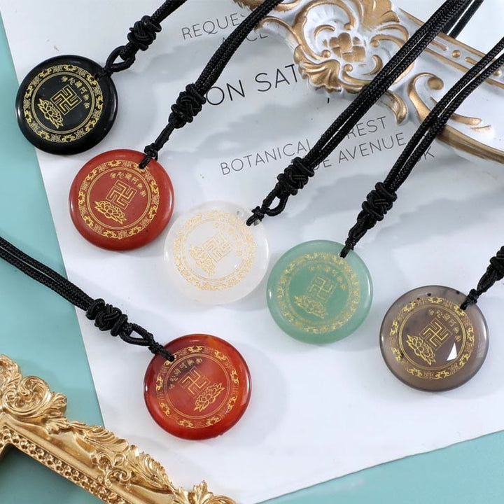 Collier pendentif de purification en obsidienne noire avec Buddha Stones et motif de lotus svastika naturel et divers cristaux