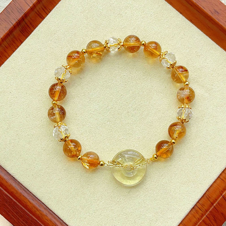 Bracelet de prospérité en cristal de citrine avec boucle de paix et Buddha Stones