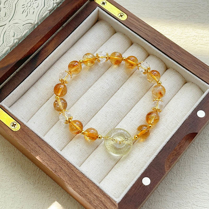 Bracelet de prospérité en cristal de citrine avec boucle de paix et Buddha Stones