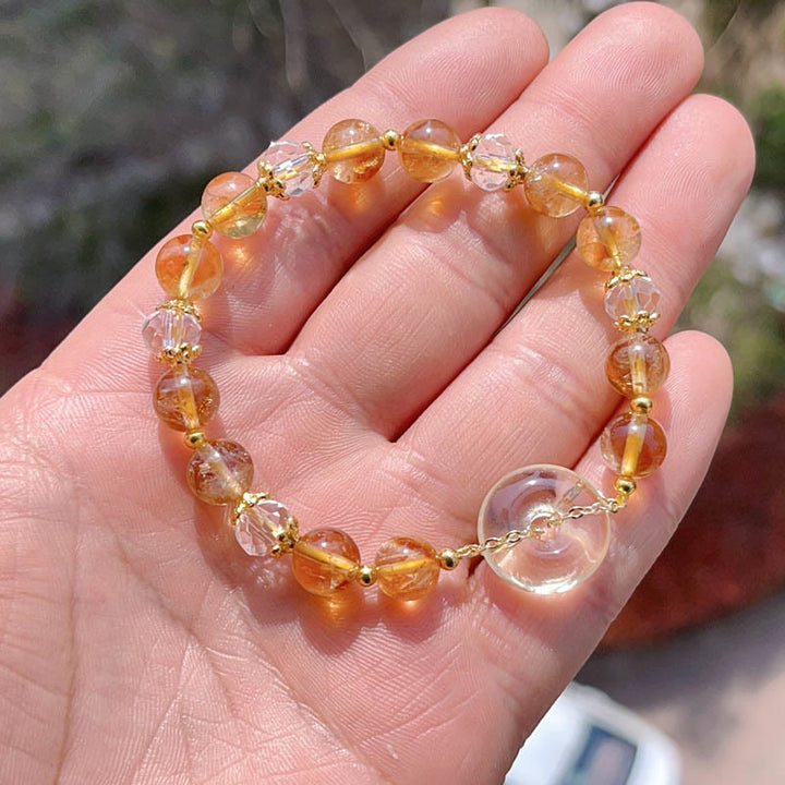 Bracelet de prospérité en cristal de citrine avec boucle de paix et Buddha Stones