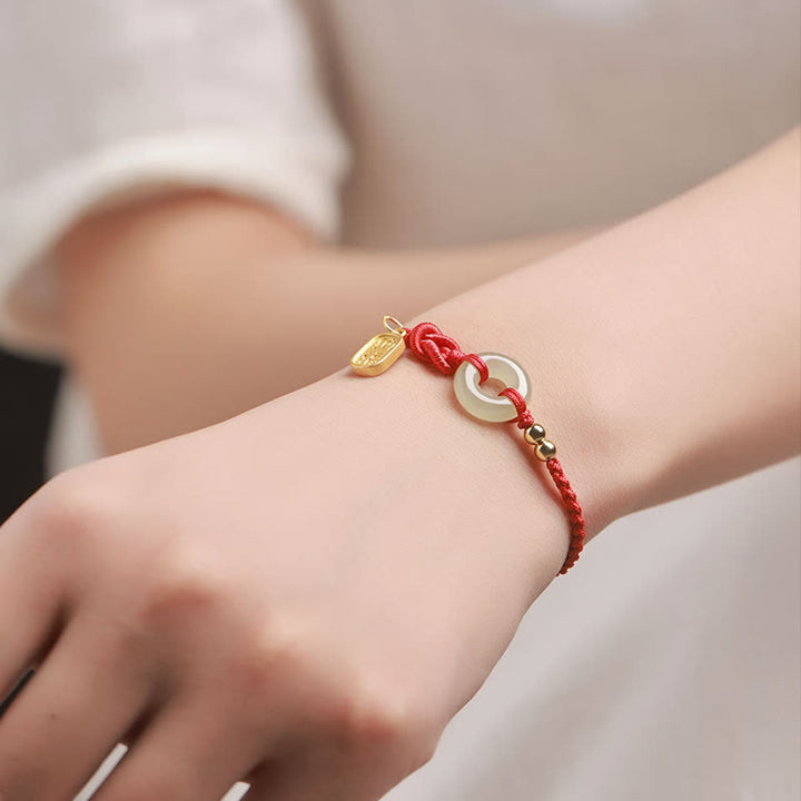 Bracelet porte-bonheur en jade Hetian avec Buddha Stones et boucle de paix