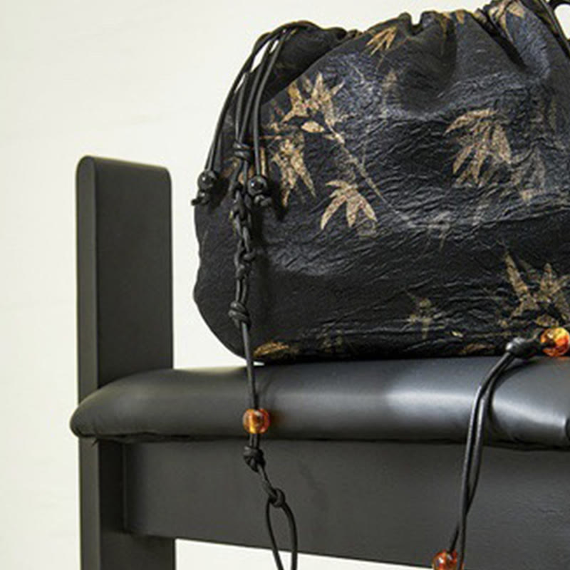 Sac à bandoulière en acétate à motif de feuilles de bambou jaune Buddha Stones