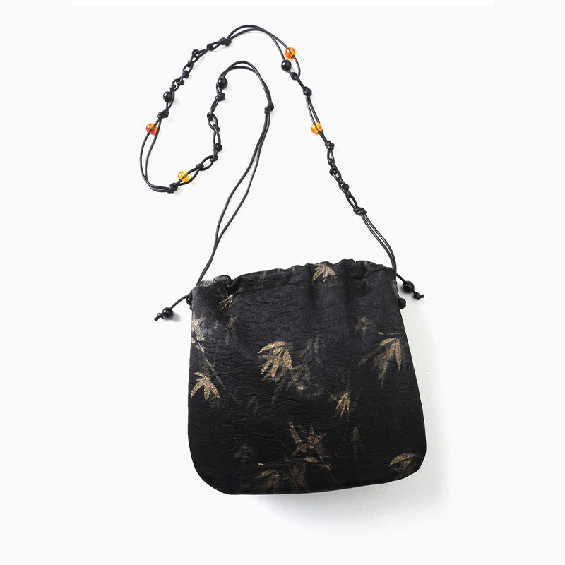 Sac à bandoulière en acétate à motif de feuilles de bambou jaune Buddha Stones