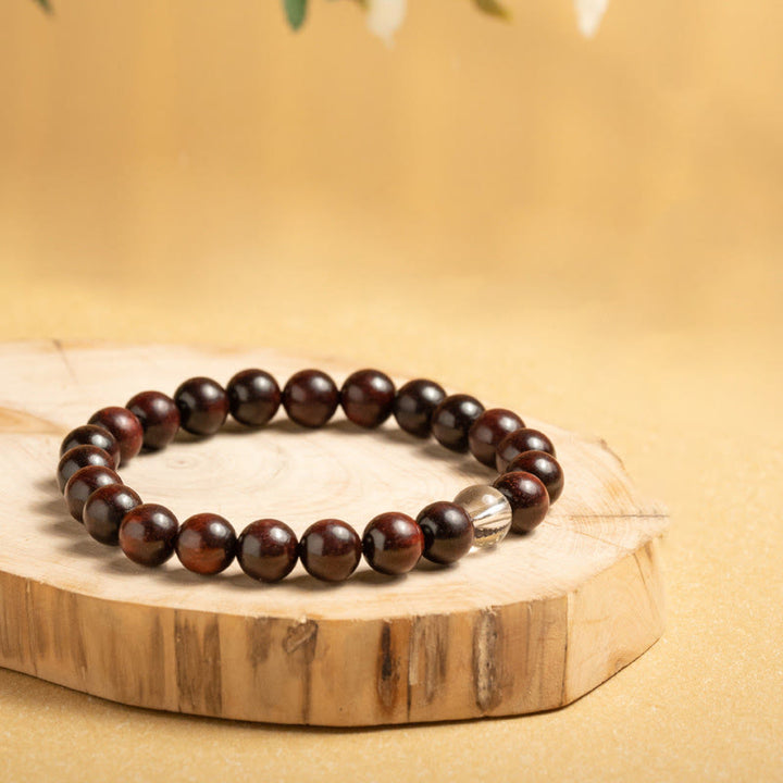 Bracelet de protection en cristal blanc et bois de santal rouge à petites feuilles de Buddha Stones