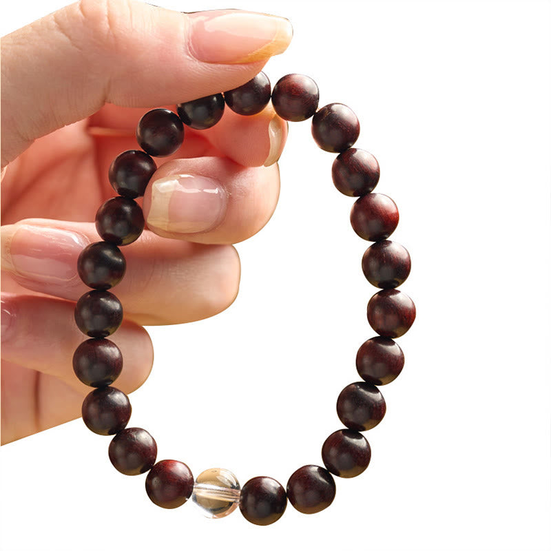 Bracelet de protection en cristal blanc et bois de santal rouge à petites feuilles de Buddha Stones