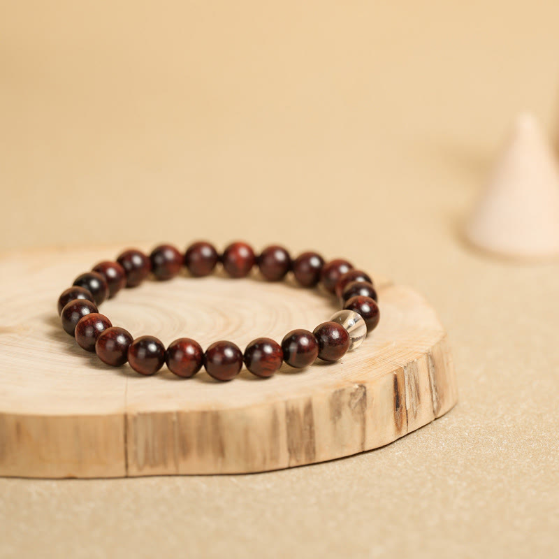 Bracelet de protection en cristal blanc et bois de santal rouge à petites feuilles de Buddha Stones