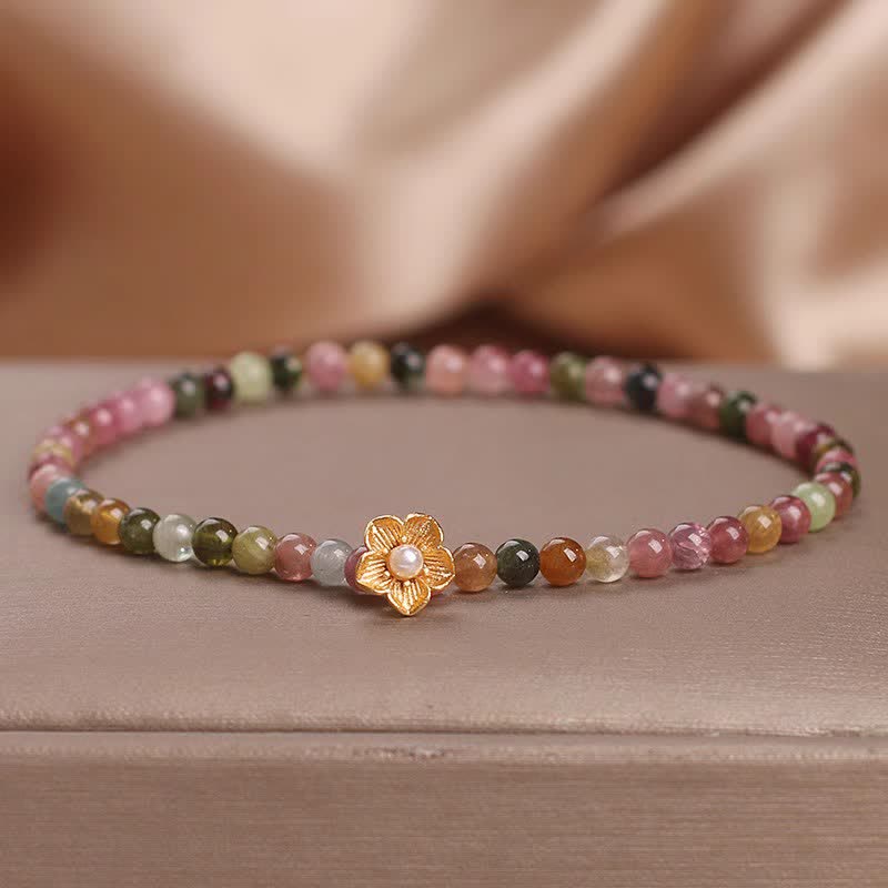 Bracelet positif en Buddha Stones et fleurs de tourmaline colorées