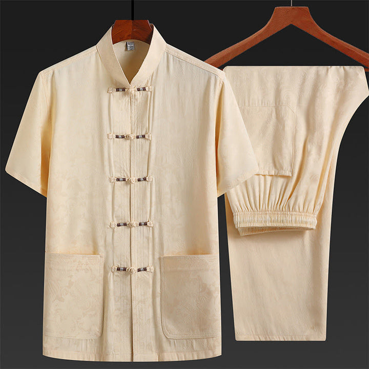 Buddha Stones le long de la rivière pendant le festival de Qingming Motif Costume Tang traditionnel Chemise à manches courtes Pantalon Vêtements Ensemble pour hommes