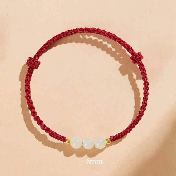 Bracelet tressé en perles rondes de jade fabriquées à la main par Buddha Stones