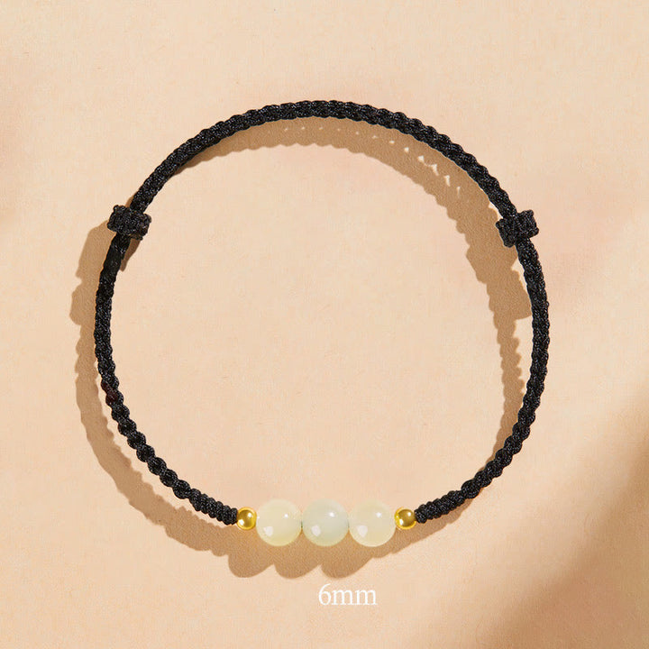 Bracelet tressé en perles rondes de jade fabriquées à la main par Buddha Stones