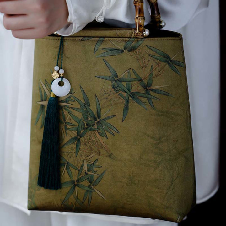 Sac à main avec poignées en bambou et feuilles de bambou jaunes et vertes en Buddha Stones