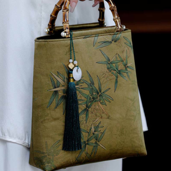 Sac à main avec poignées en bambou et feuilles de bambou jaunes et vertes en Buddha Stones