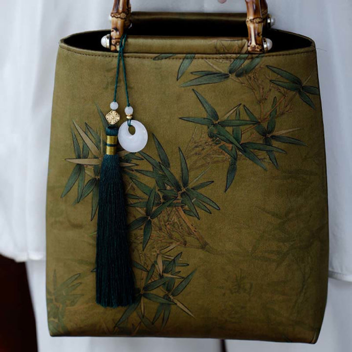 Sac à main avec poignées en bambou et feuilles de bambou jaunes et vertes en Buddha Stones