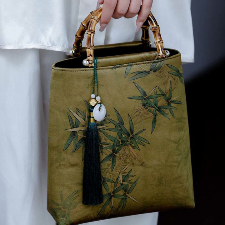 Sac à main avec poignées en bambou et feuilles de bambou jaunes et vertes en Buddha Stones
