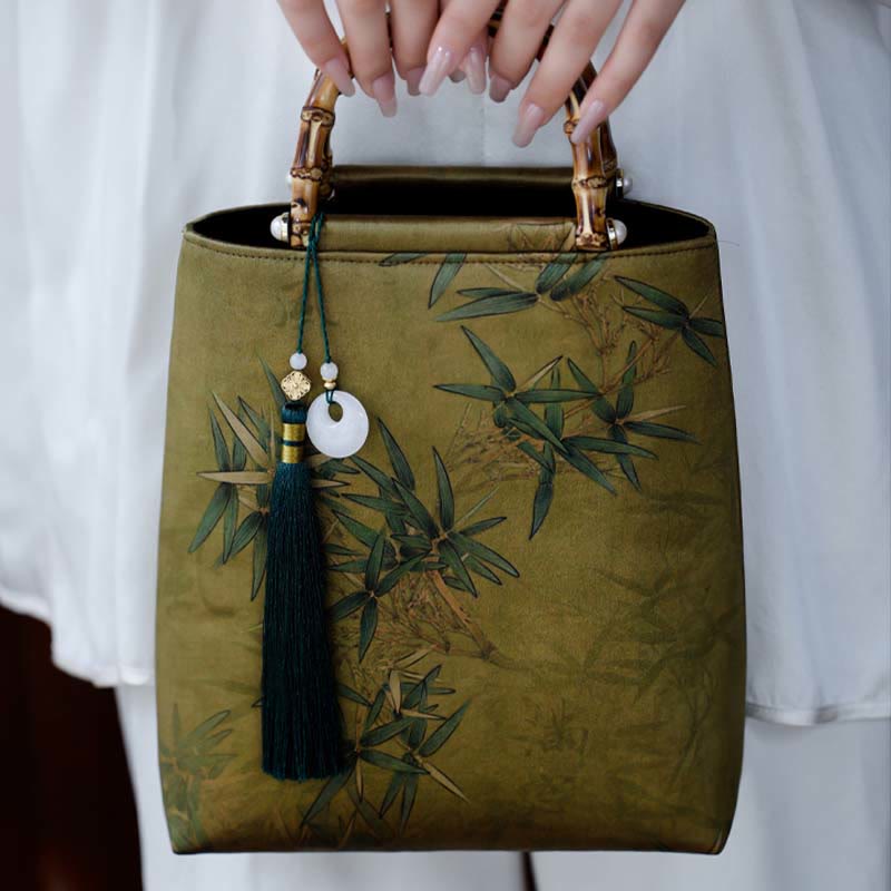 Sac à main avec poignées en bambou et feuilles de bambou jaunes et vertes en Buddha Stones