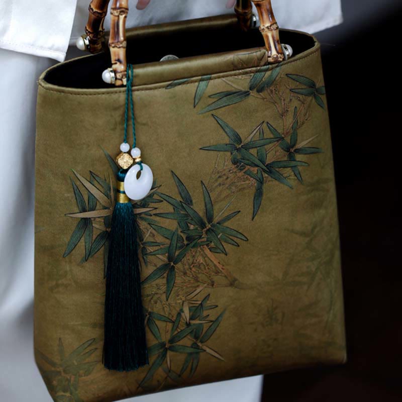 Sac à main avec poignées en bambou et feuilles de bambou jaunes et vertes en Buddha Stones