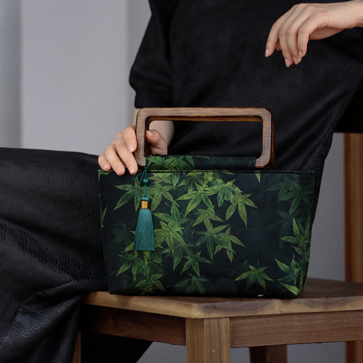 Sac à main vintage en Buddha Stones avec fleurs brunes et feuilles de bambou vertes et poignées en bois et fermeture éclair