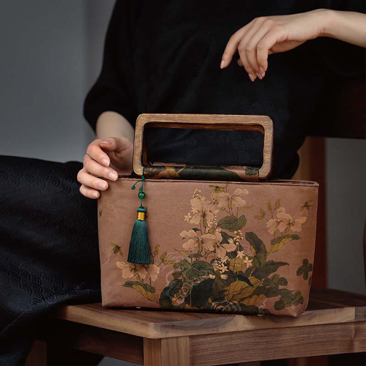 Sac à main vintage en Buddha Stones avec fleurs brunes et feuilles de bambou vertes et poignées en bois et fermeture éclair