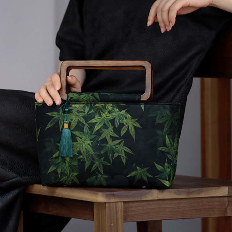 Sac à main vintage en Buddha Stones avec fleurs brunes et feuilles de bambou vertes et poignées en bois et fermeture éclair