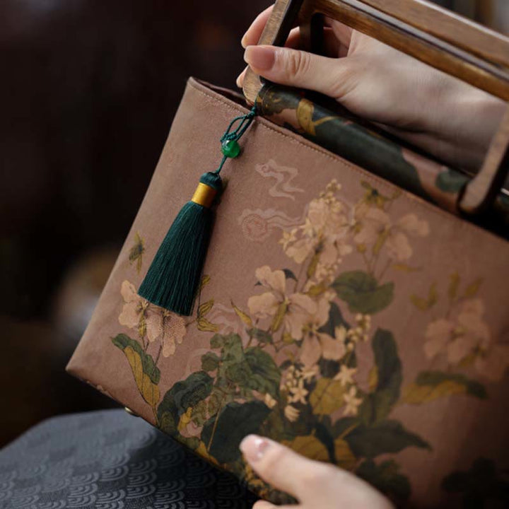 Sac à main vintage en Buddha Stones avec fleurs brunes et feuilles de bambou vertes et poignées en bois et fermeture éclair