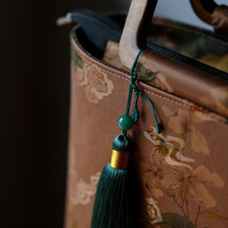 Sac à main vintage en Buddha Stones avec fleurs brunes et feuilles de bambou vertes et poignées en bois et fermeture éclair