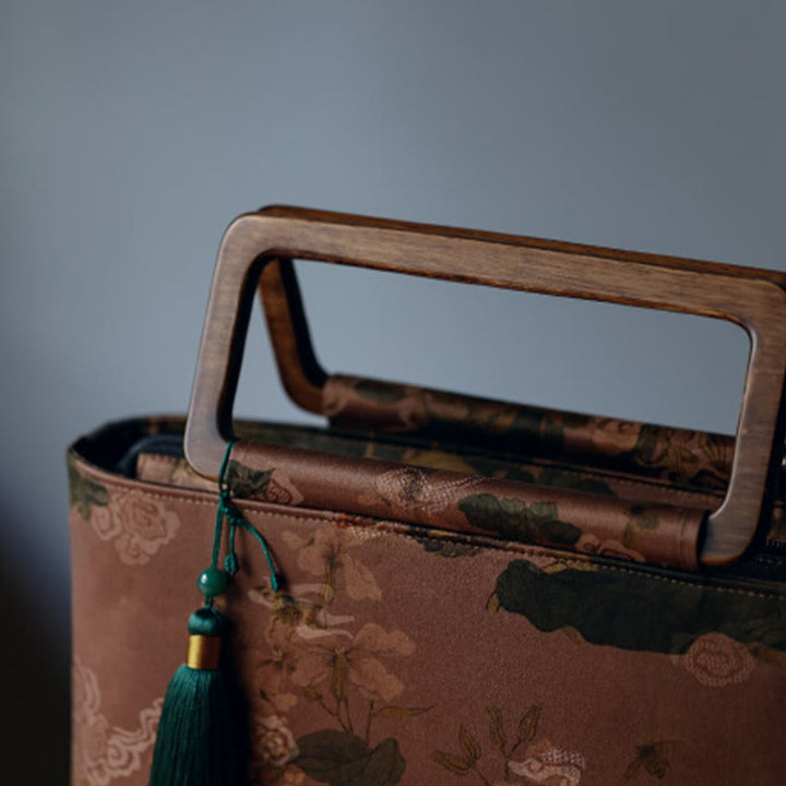 Sac à main vintage en Buddha Stones avec fleurs brunes et feuilles de bambou vertes et poignées en bois et fermeture éclair