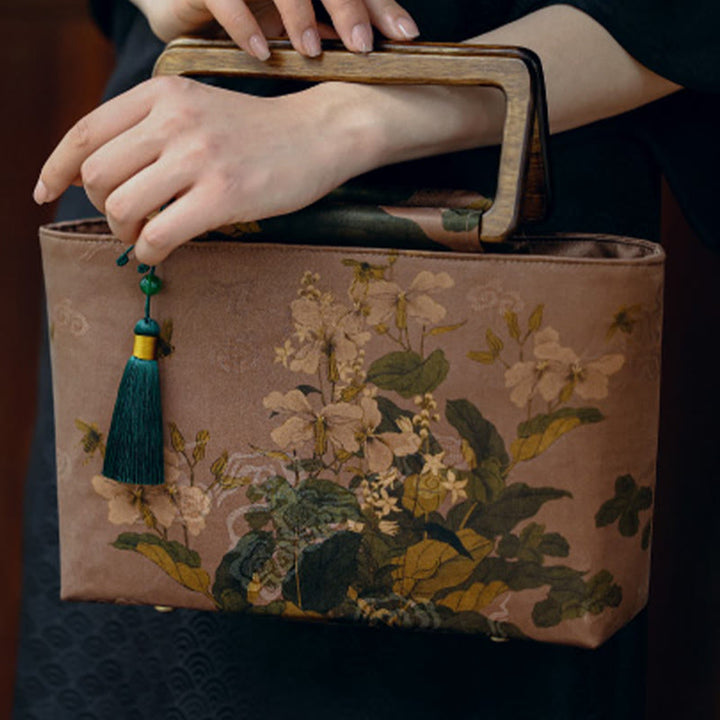 Sac à main vintage en Buddha Stones avec fleurs brunes et feuilles de bambou vertes et poignées en bois et fermeture éclair