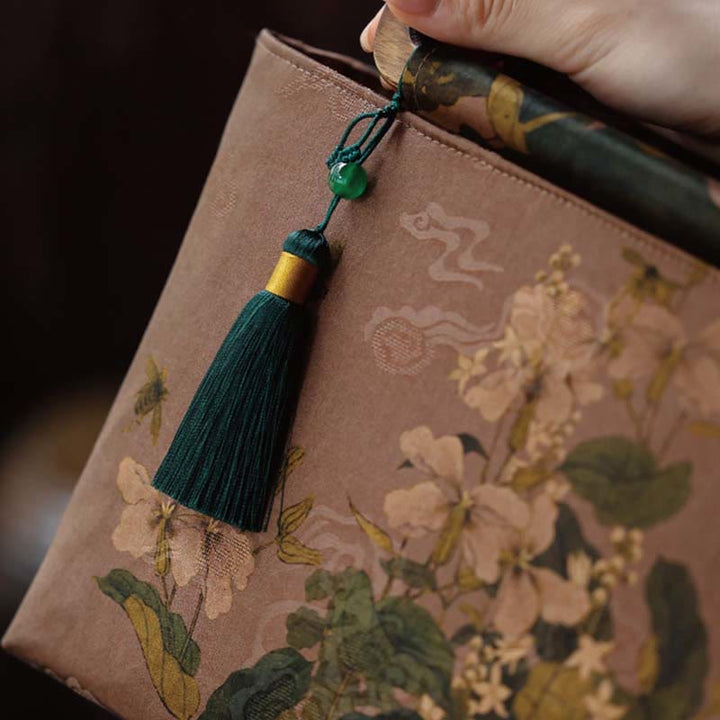Sac à main vintage en Buddha Stones avec fleurs brunes et feuilles de bambou vertes et poignées en bois et fermeture éclair