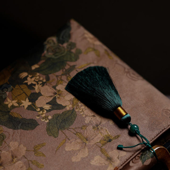 Sac à main vintage en Buddha Stones avec fleurs brunes et feuilles de bambou vertes et poignées en bois et fermeture éclair