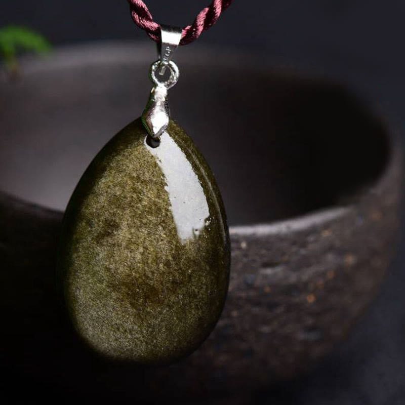Collier pendentif goutte d'eau en obsidienne noire et dorée avec Buddha Stones