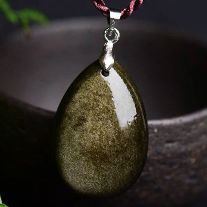 Collier pendentif goutte d'eau en obsidienne noire et dorée avec Buddha Stones