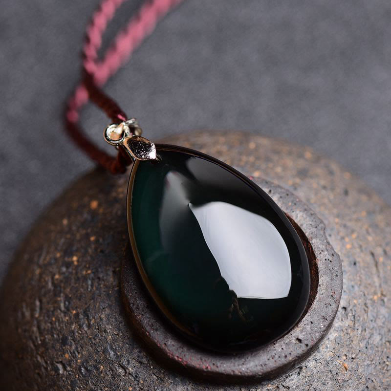 Collier pendentif goutte d'eau en obsidienne noire et dorée avec Buddha Stones