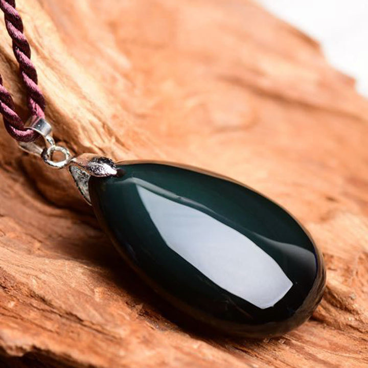 Collier pendentif goutte d'eau en obsidienne noire et dorée avec Buddha Stones
