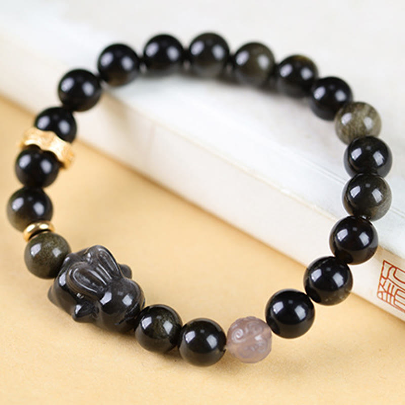 Bracelet de protection lapin mignon en Buddha Stones dorée et brillante en obsidienne noire et argentée