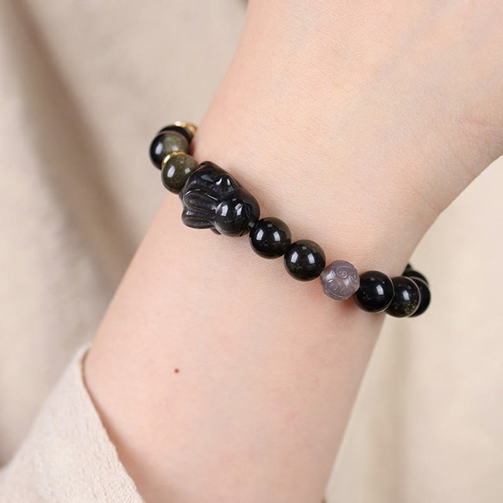 Bracelet de protection lapin mignon en Buddha Stones dorée et brillante en obsidienne noire et argentée