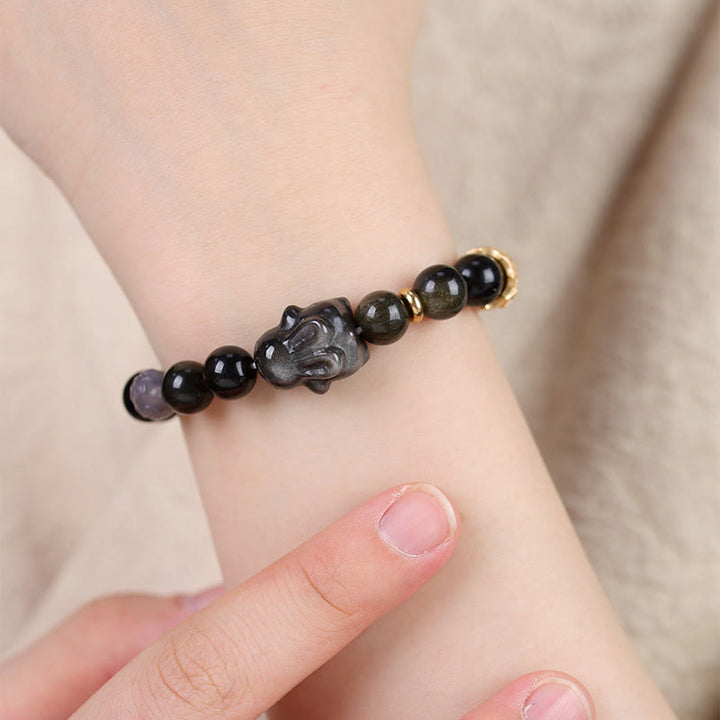 Bracelet de protection lapin mignon en Buddha Stones dorée et brillante en obsidienne noire et argentée