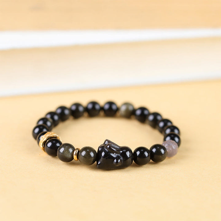 Bracelet de protection lapin mignon en Buddha Stones dorée et brillante en obsidienne noire et argentée