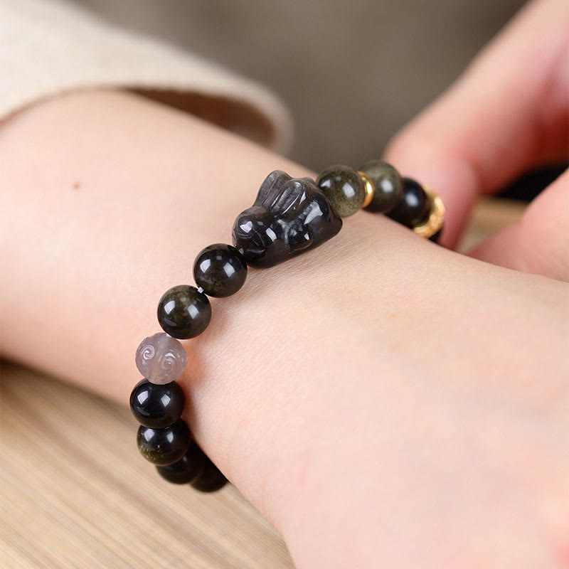 Bracelet de protection lapin mignon en Buddha Stones dorée et brillante en obsidienne noire et argentée