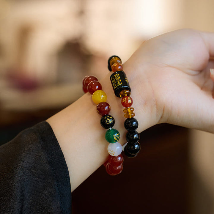 Bracelet de sagesse et de richesse en onyx noir et agate rouge avec cinq éléments de Buddha Stones