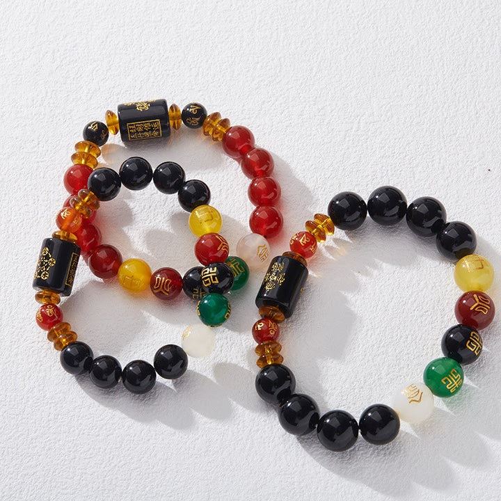 Bracelet de sagesse et de richesse en onyx noir et agate rouge avec cinq éléments de Buddha Stones