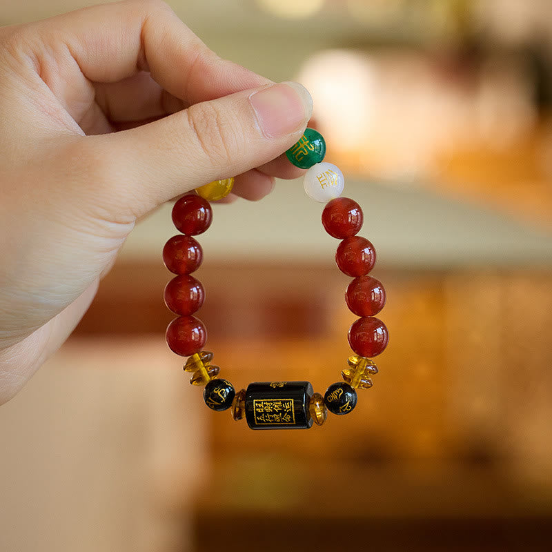 Bracelet de sagesse et de richesse en onyx noir et agate rouge avec cinq éléments de Buddha Stones