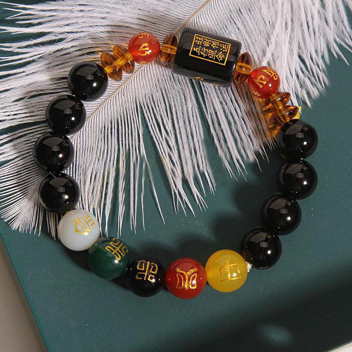 Bracelet de sagesse et de richesse en onyx noir et agate rouge avec cinq éléments de Buddha Stones
